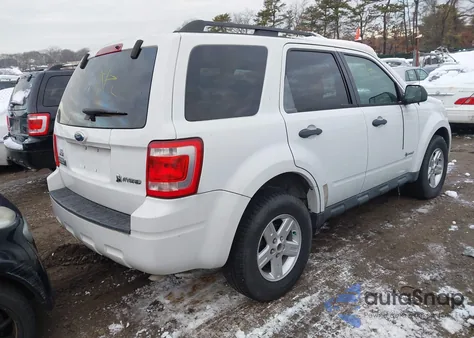 2009 Ford Escape Hybrid Limited z USA, uszkodzony, nr VIN 1FMCU59379KA25311